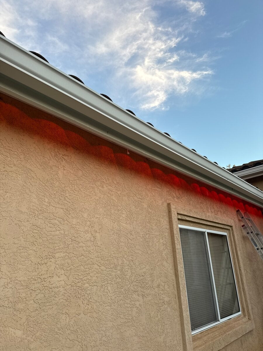 Red permanent LED roofline lighting installation
