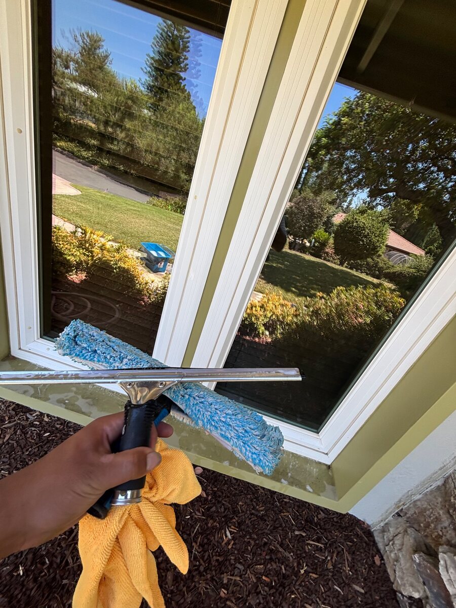 Exterior window washing in progress